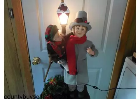Christmas man and boy with lighted lamp post decoration